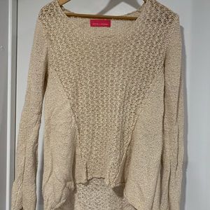 Loose fit uneven length sweater